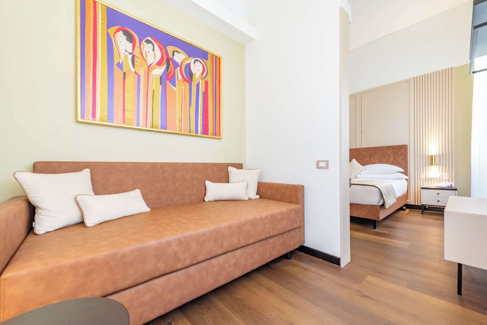 Junior Suite, 1 King Bed, Non Smoking (with Single Sofabed) | Minibar, desk, rollaway beds, free WiFi