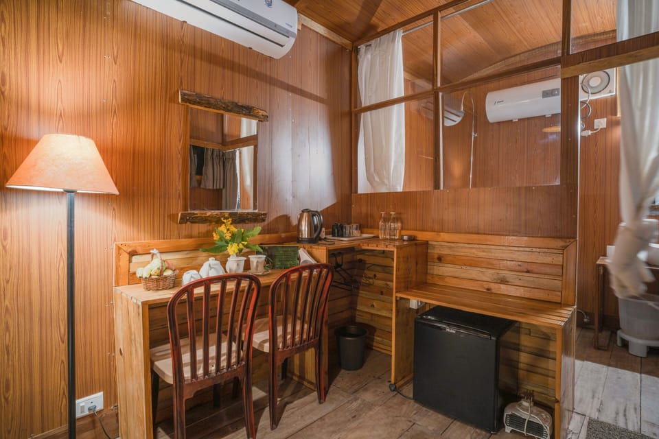 Wooden cottage | Living area | Foosball, books, music library, computer monitors