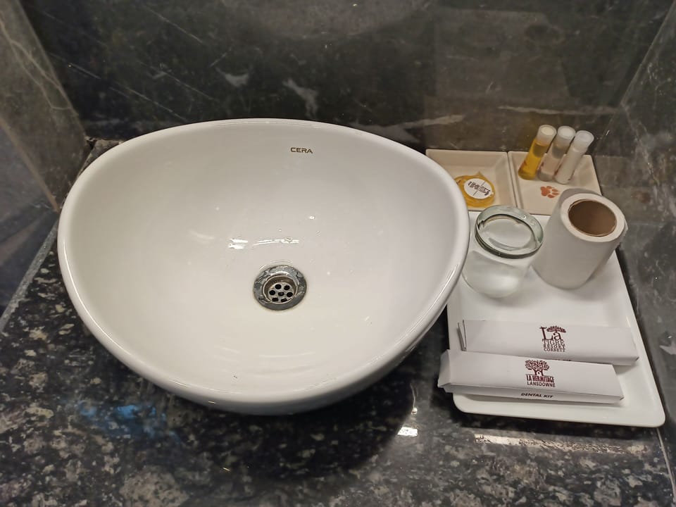Rainfall showerhead, eco-friendly toiletries, hair dryer, bathrobes