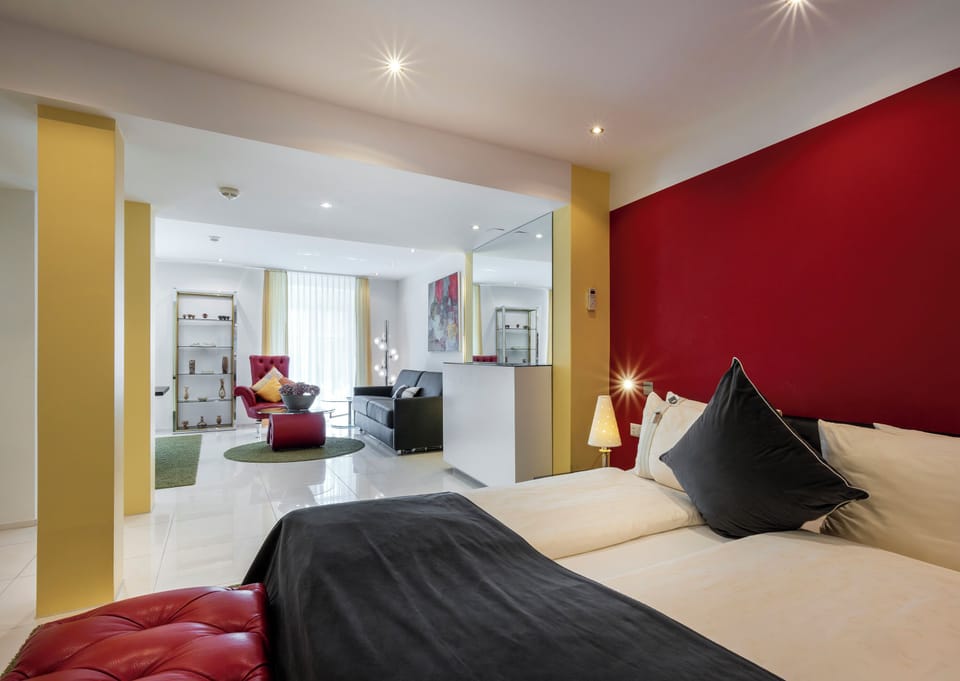 Exclusive Suite, 1 King Bed with Sofa bed, Kitchenette | Premium bedding, minibar (free items), in-room safe, desk