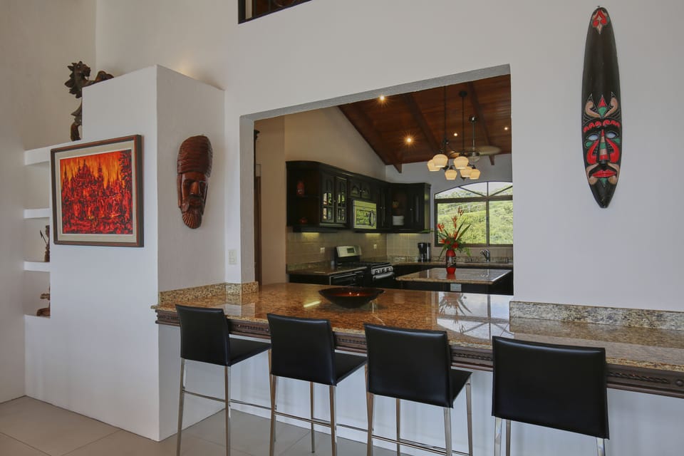 Gather at the breakfast bar for casual meals and conversation