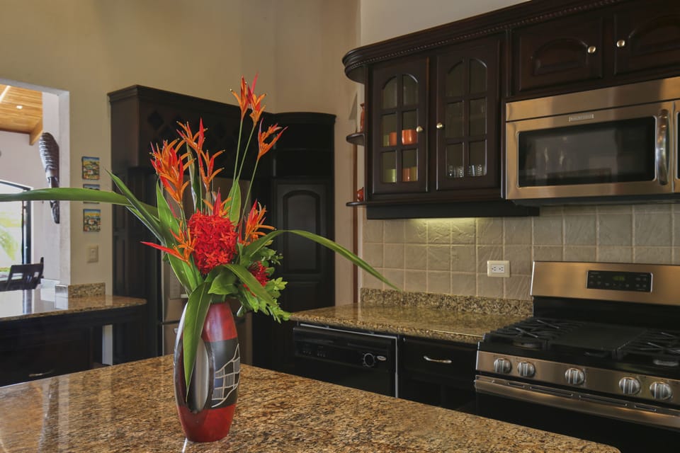 Gourmet kitchen with granite counter tops, stainless steel appliances