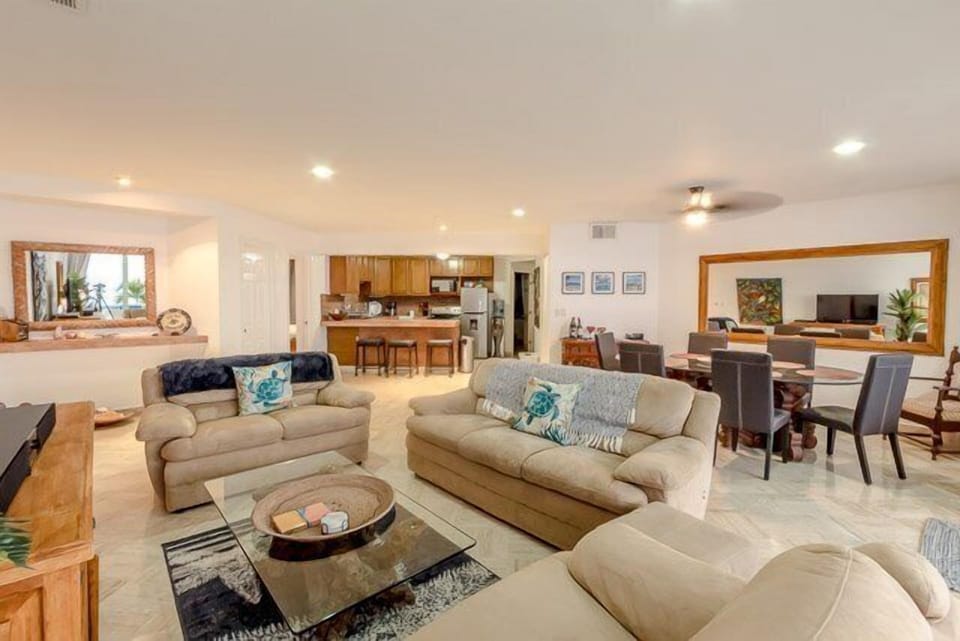 The fantastically appointed living room offers stunning views of the ocean