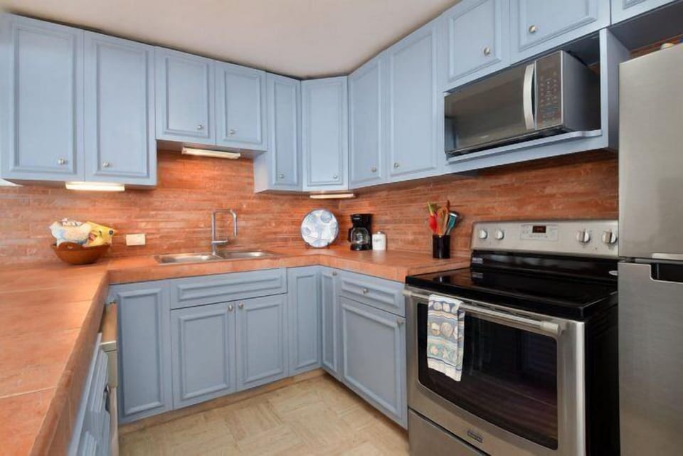 Imagine whipping up your favorite dishes in this fully stocked kitchen