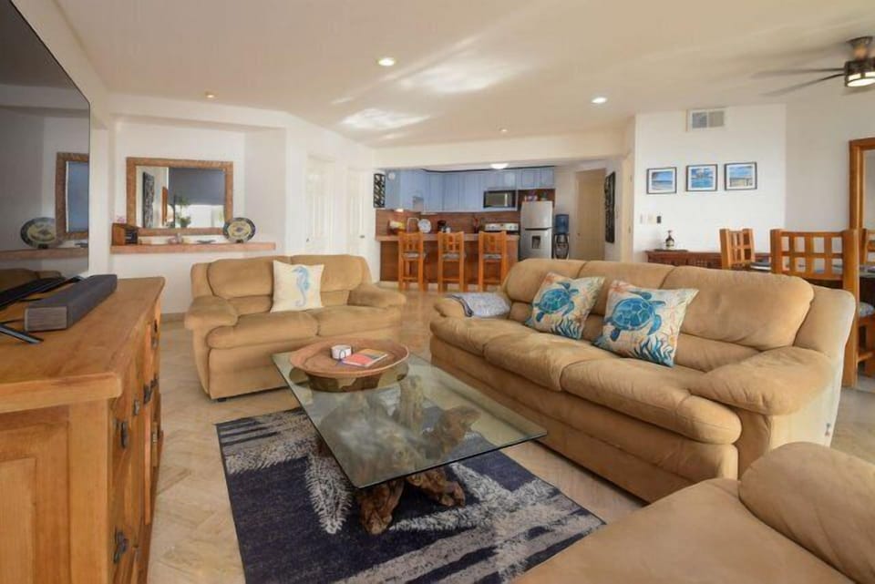 The fantastically appointed living room offers stunning views of the ocean