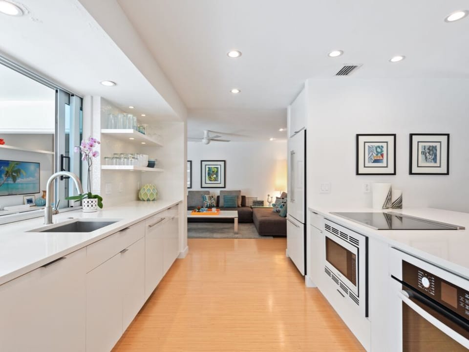 Fantastic high-end kitchen!  Opens to bar in pool area.