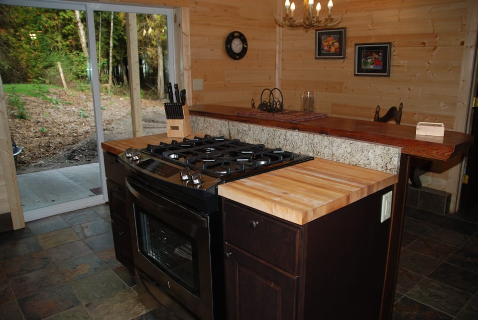 Cooking island with gas range.