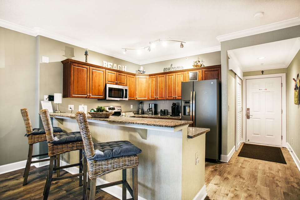 Bar / kitchen with view to entry door