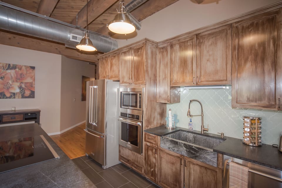 Kitchen featuring oven microwave and cooktop