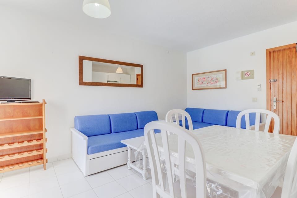 Apartment, 1 Bedroom, Balcony | Living area | Flat-screen TV