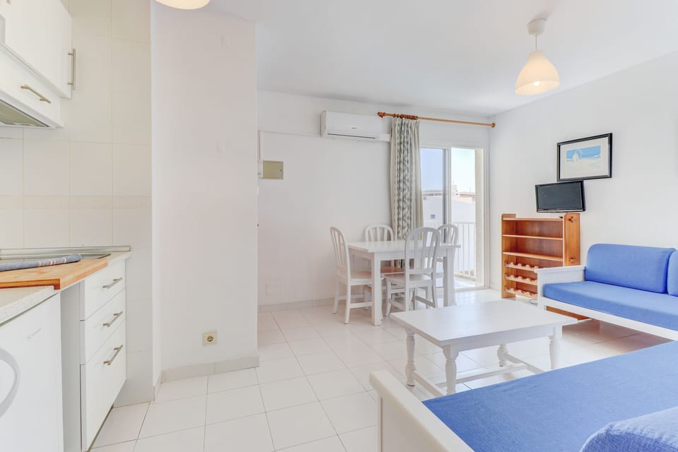 Apartment, 1 Bedroom, Balcony | Living area | Flat-screen TV