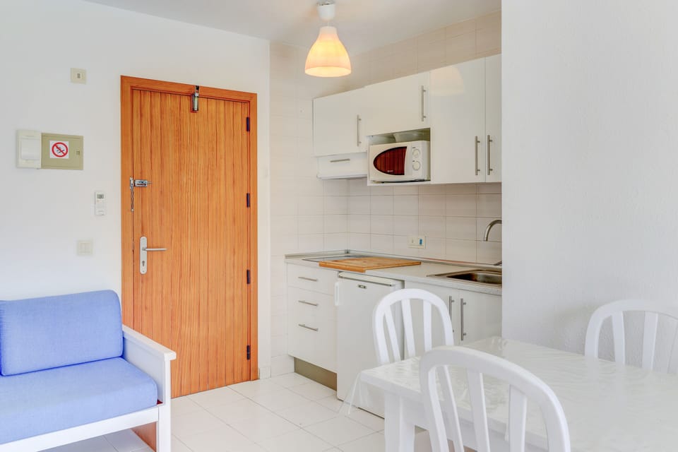 Apartment, 1 Bedroom, Balcony | Living area | Flat-screen TV