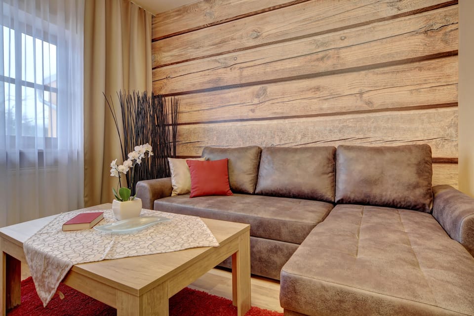 Suite (Auszeit) | Living area | Flat-screen TV