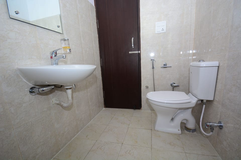 Shower, free toiletries, slippers, towels