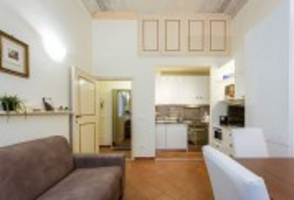 Apartment, 1 Bedroom | Living area | 32-inch TV with digital channels