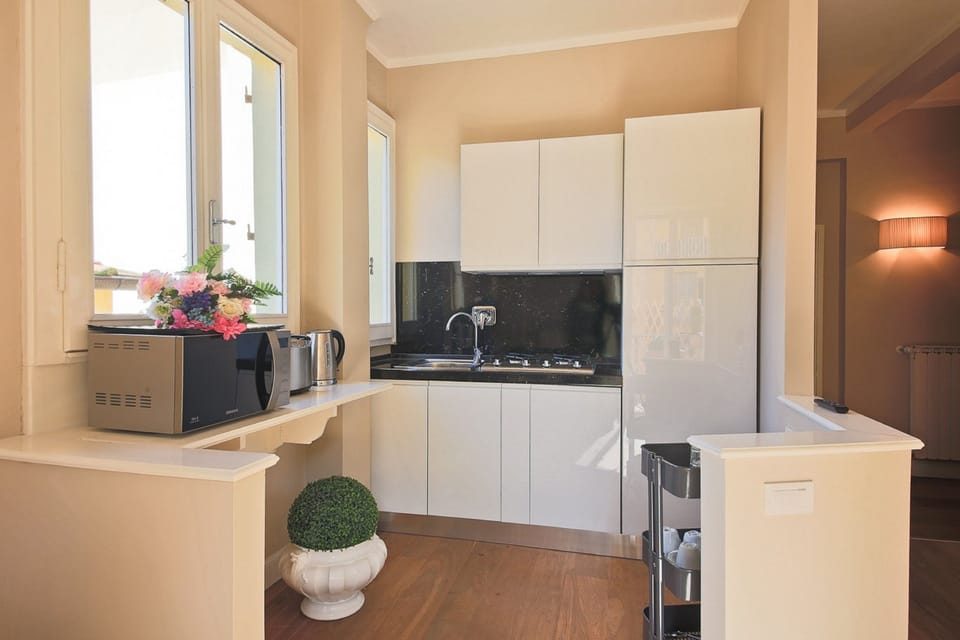 Apartment, 2 Bedrooms | Private kitchen | Fridge, microwave, cookware/dishes/utensils
