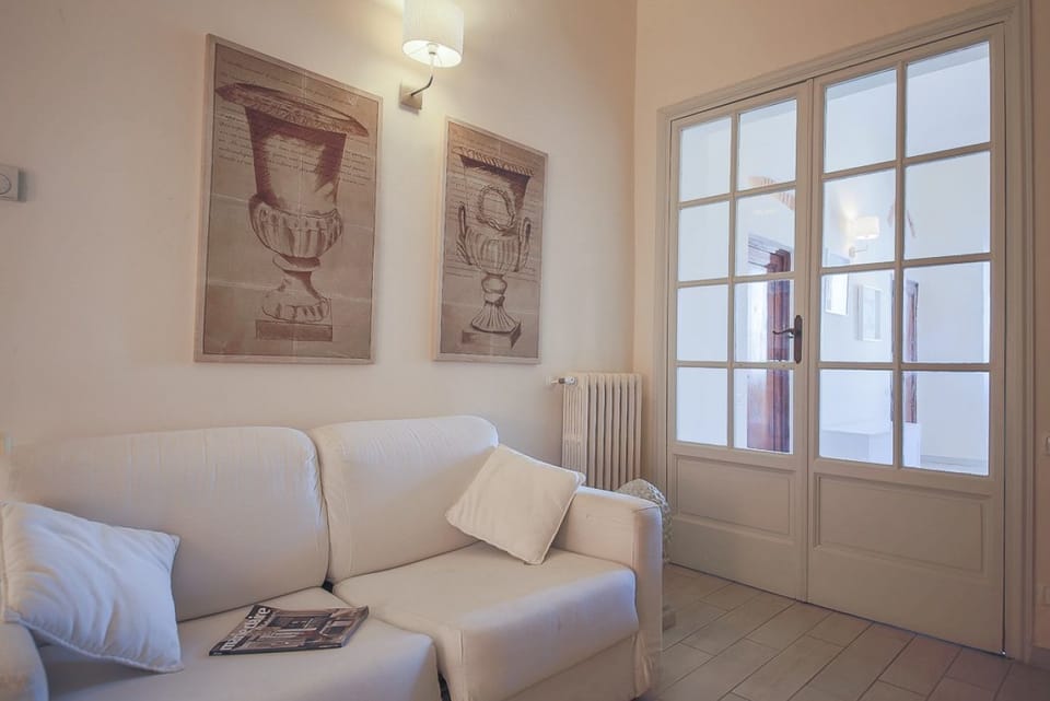 Apartment, 2 Bedrooms | Living area | 22-inch TV with digital channels