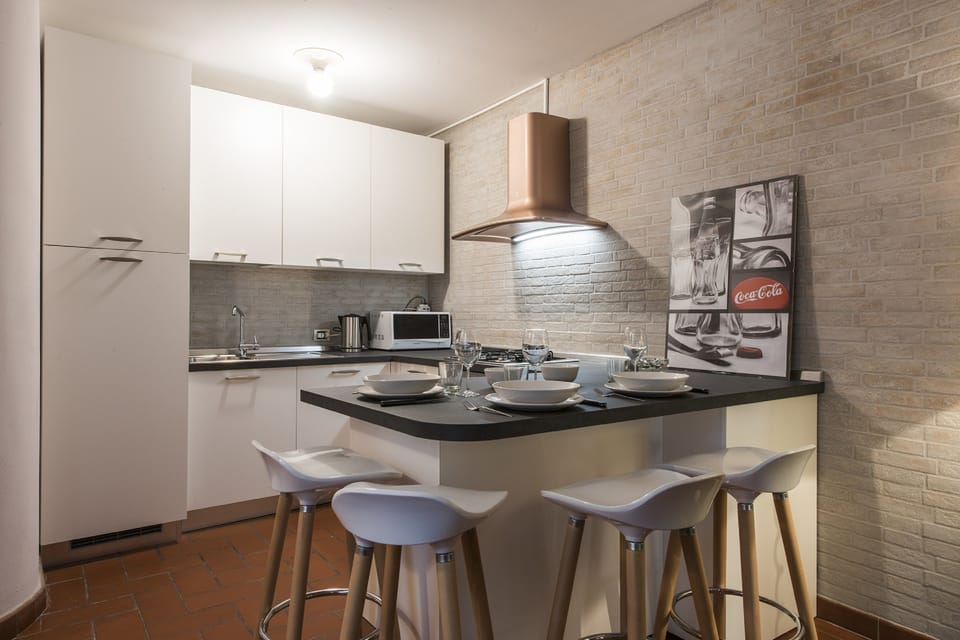 Apartment, 1 Bedroom | Living area | Flat-screen TV