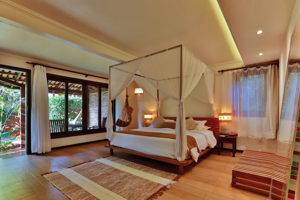 Quarto casal superluxo, banheira de hidromassagem, vista para o jardim | Premium bedding, minibar, blackout drapes, free WiFi