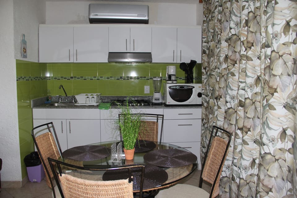 Family Apartment II | Private kitchenette | Full-size fridge, microwave, stovetop, cookware/dishes/utensils