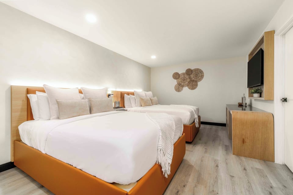 Executive Room, 2 Double Beds | In-room safe, individually decorated, individually furnished, desk