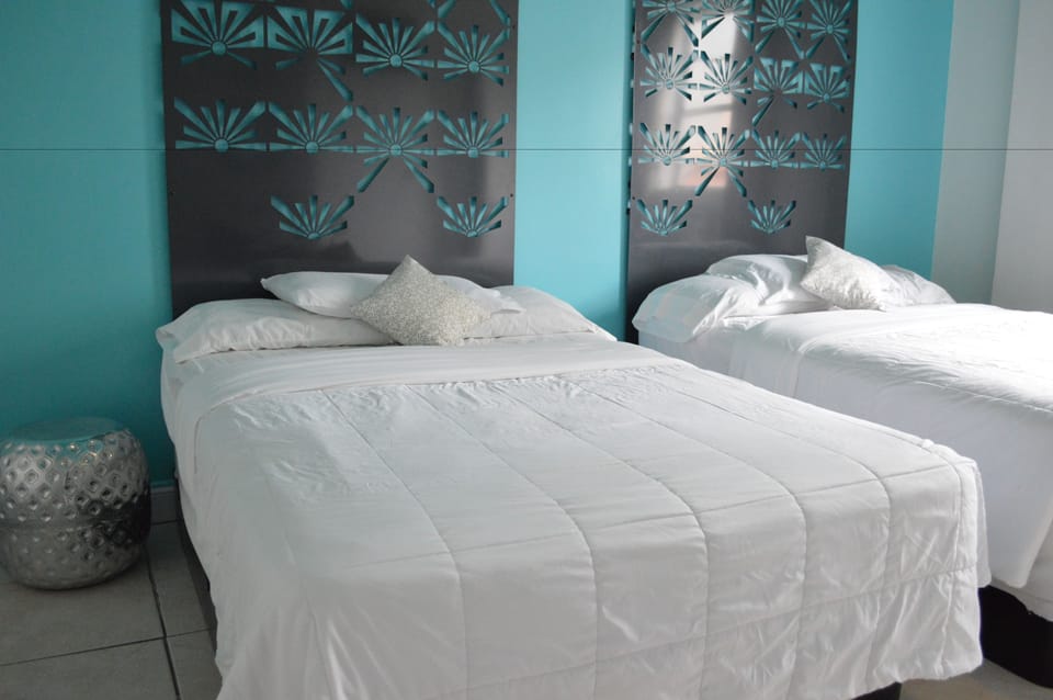 Quadruple Room, 2 Double Beds | In-room safe, blackout drapes, iron/ironing board, free WiFi
