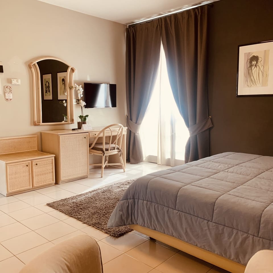 Deluxe Double Room, Private Bathroom, Poolside | Down comforters, minibar, in-room safe, desk