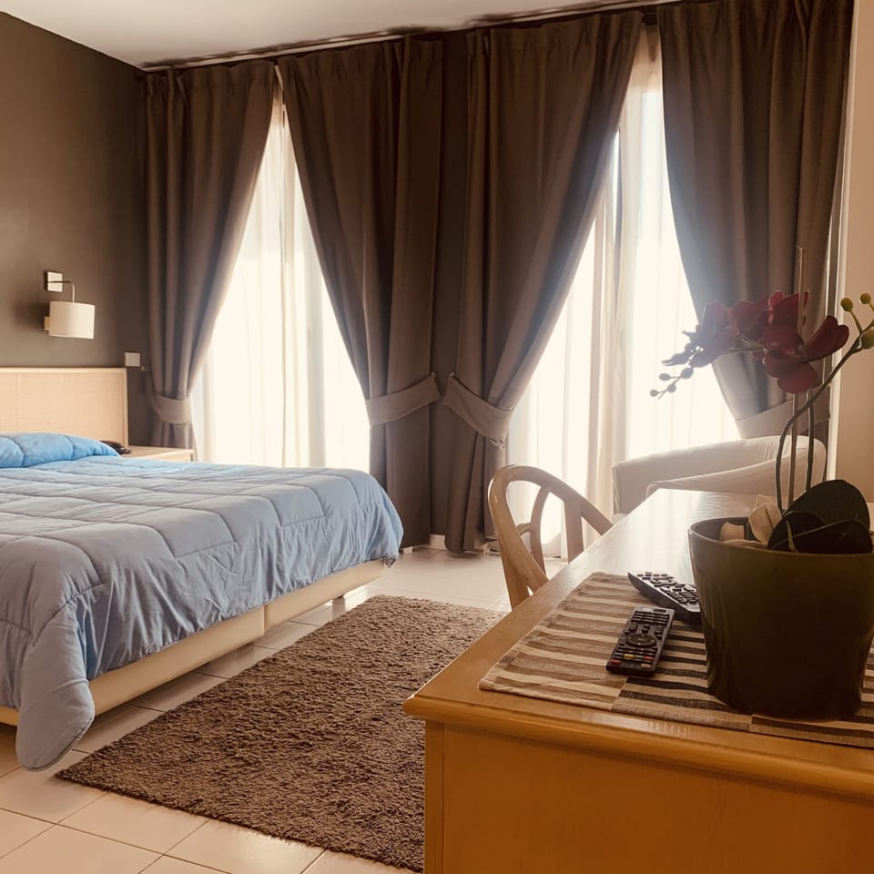 Deluxe Double Room, Private Bathroom, Poolside | Down comforters, minibar, in-room safe, desk