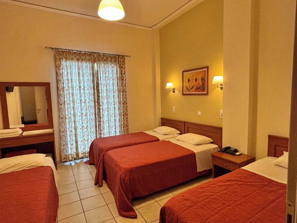 Quadruple Room | Pillowtop beds, in-room safe, individually decorated
