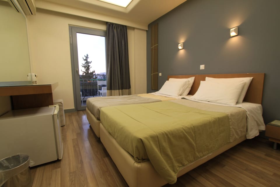 Basic Apartment, 1 Bedroom, Annex Building | Minibar, in-room safe, individually decorated, individually furnished
