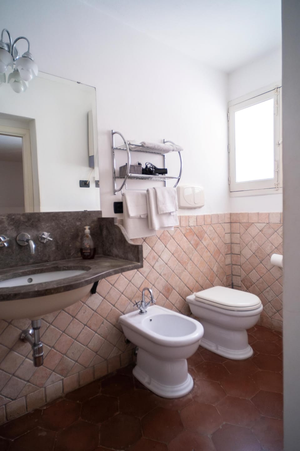 Family Apartment | Bathroom | Shower, rainfall showerhead, free toiletries, hair dryer