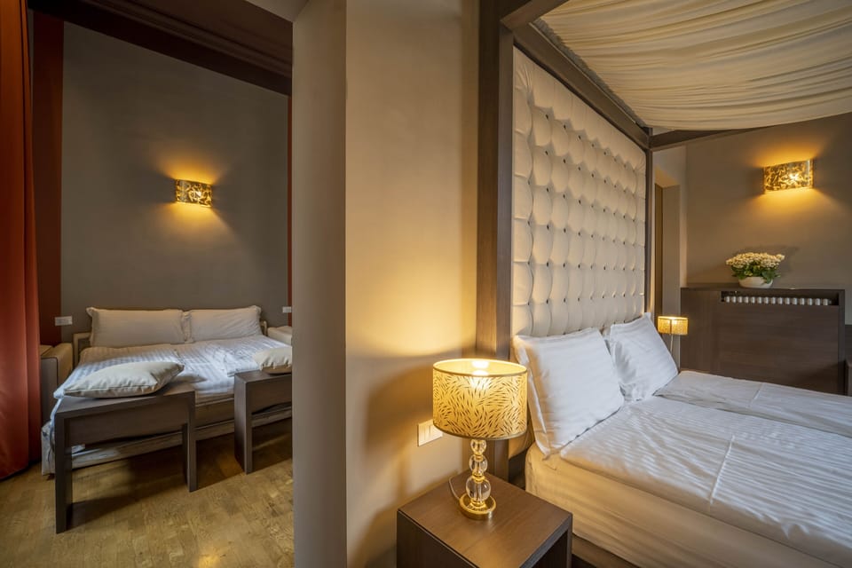 Deluxe Room, 2 Bedrooms, Refrigerator, City View | Hypo-allergenic bedding, minibar, desk, laptop workspace
