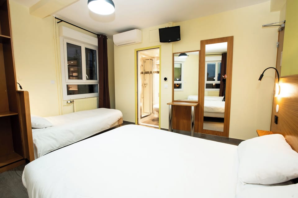 Quadruple Room | Soundproofing, free WiFi, bed sheets
