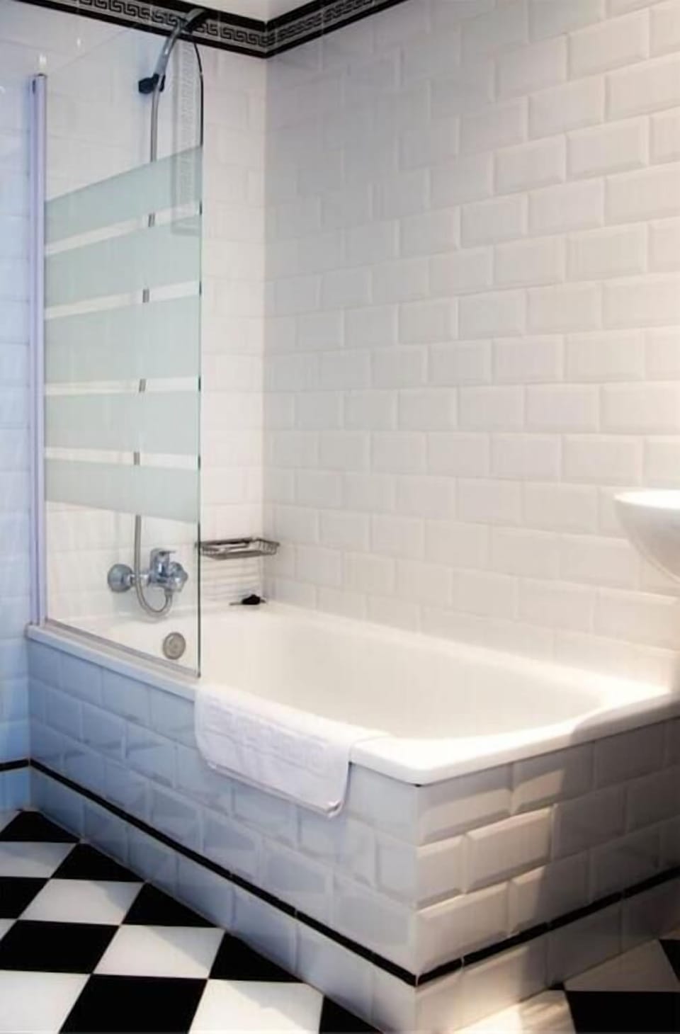 Bathtub, hair dryer, towels, soap