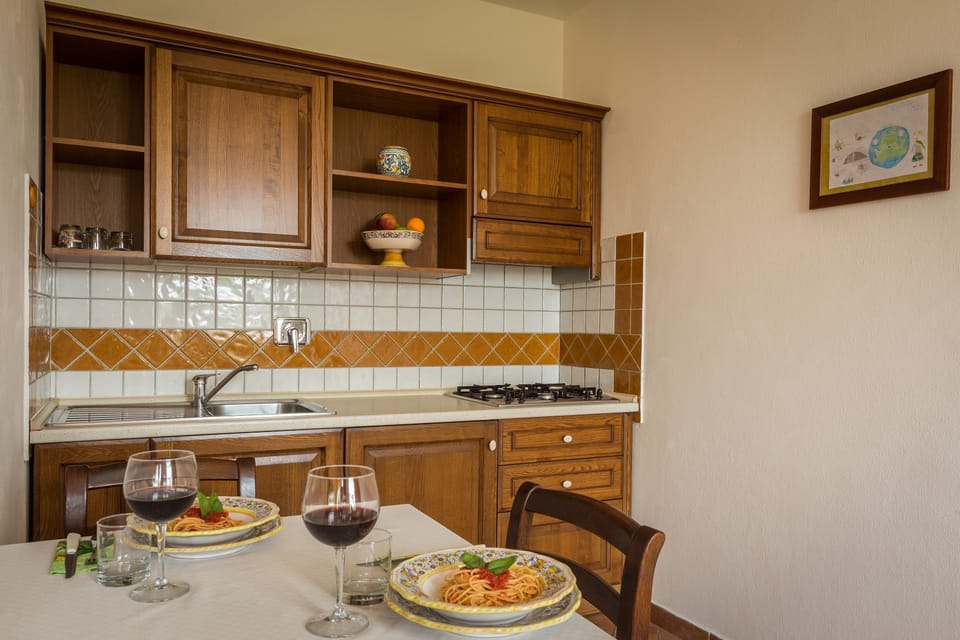Comfort Apartment, Kitchenette | Private kitchen | Full-size fridge, stovetop, espresso maker, coffee/tea maker