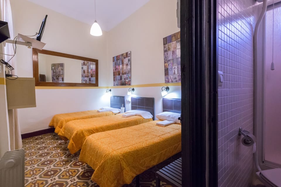 Triple Room, Private Bathroom (Welcome Drink) | Individually furnished, blackout drapes, free cribs/infant beds