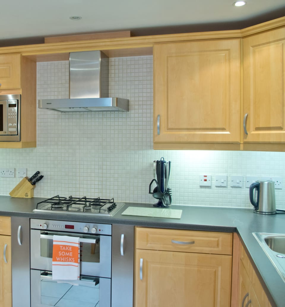 Luxury Apartment, 2 Bedrooms, Garden View | Private kitchenette | Fridge, microwave, highchair, cookware/dishes/utensils
