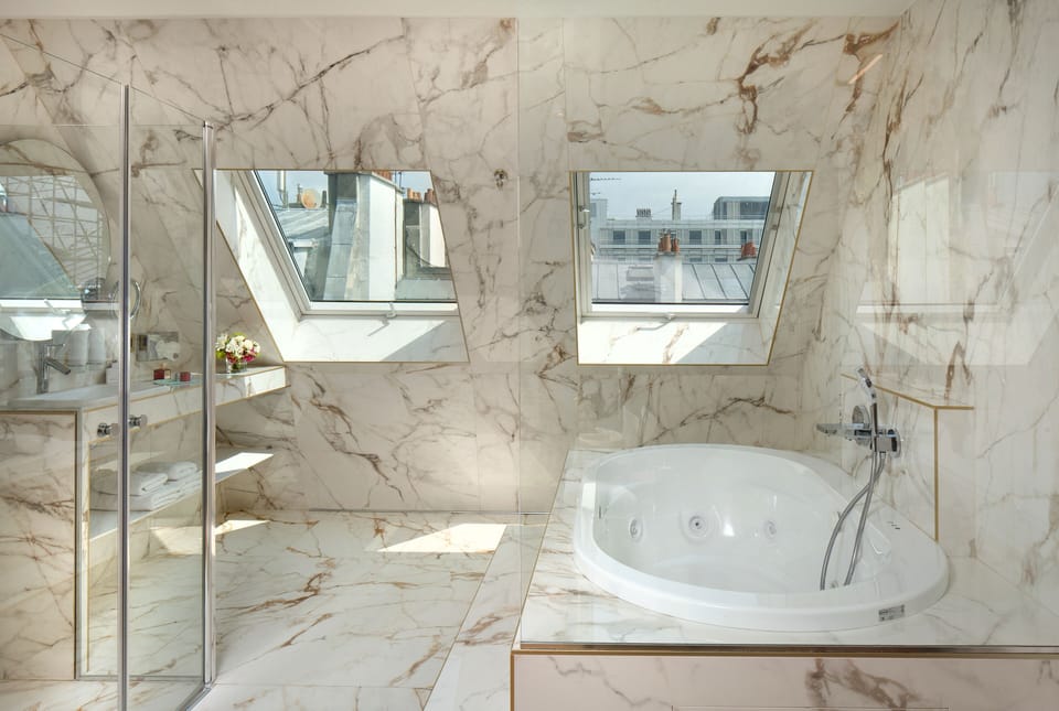 Royal Suite, 1 King Bed, Jetted Tub | Bathroom | Designer toiletries, hair dryer, bathrobes, heated floors
