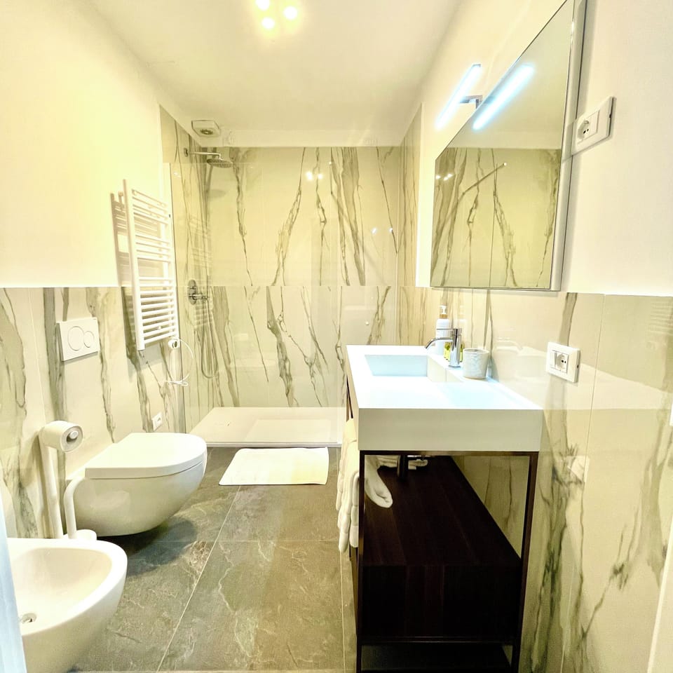 Quadruple Room | Bathroom | Separate tub and shower, hair dryer, towels