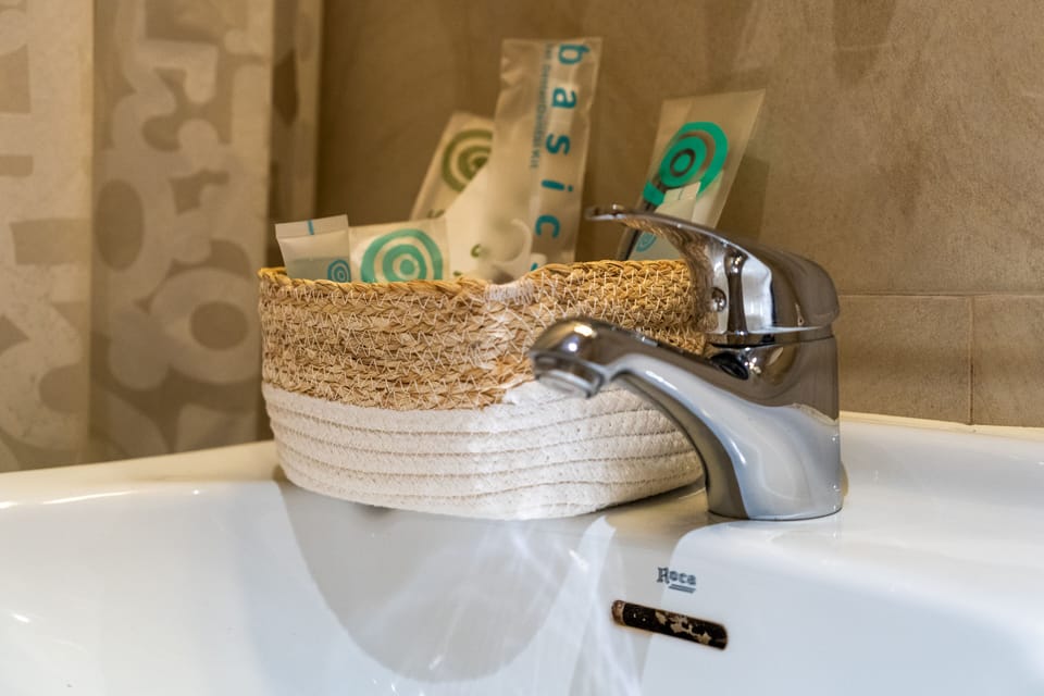 Shower, free toiletries, hair dryer, towels