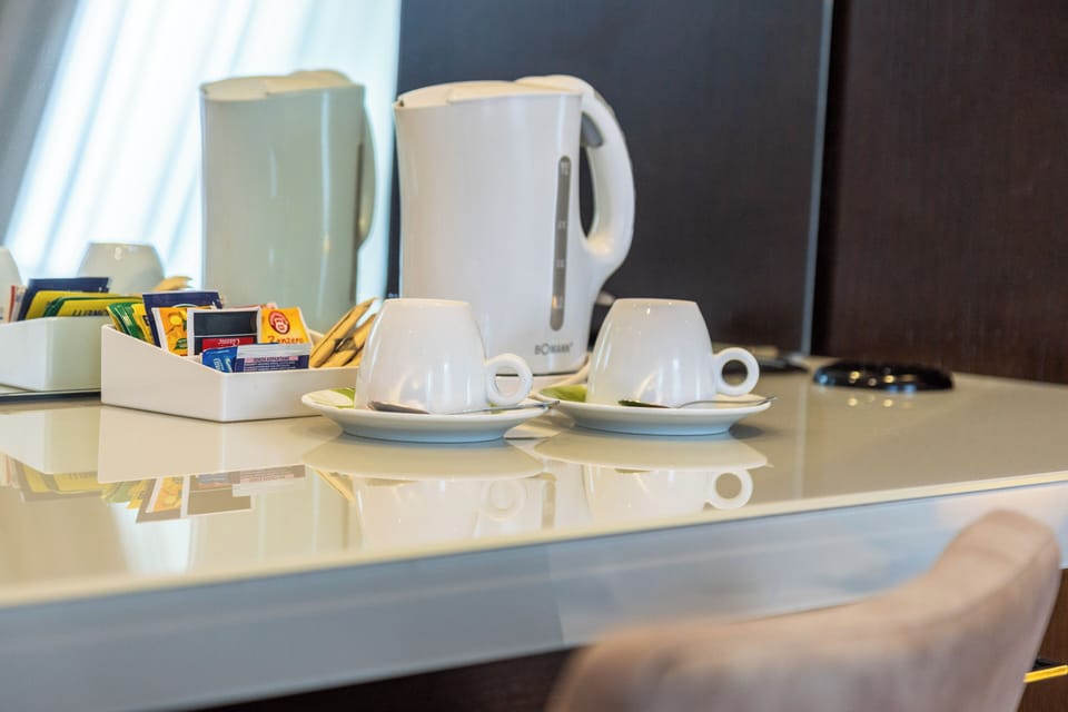 Suite | Premium bedding, down comforters, memory foam beds, minibar