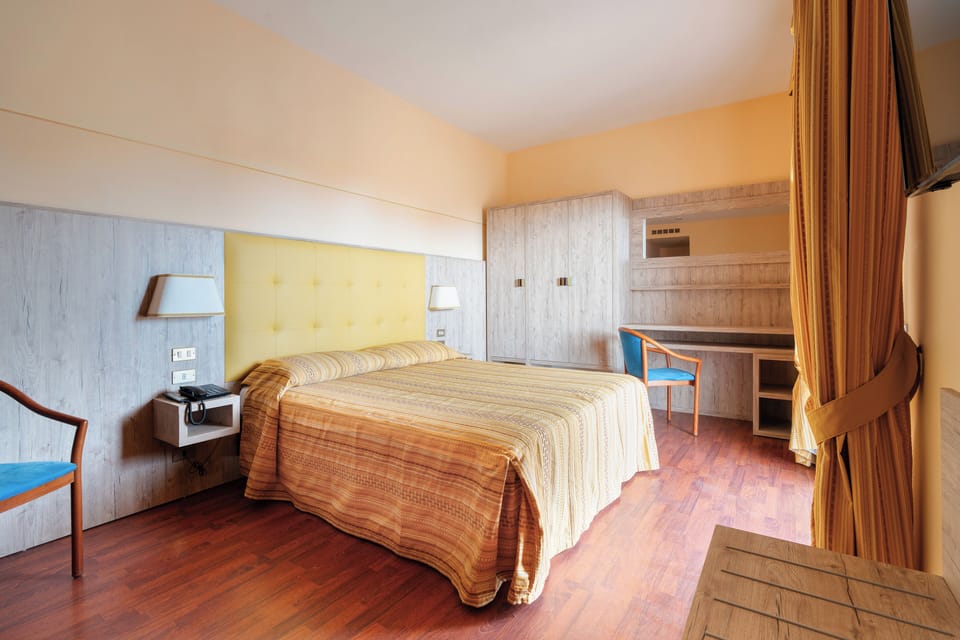 Comfort Triple Room, Non Smoking, Garden View | In-room safe, individually furnished, desk, blackout drapes