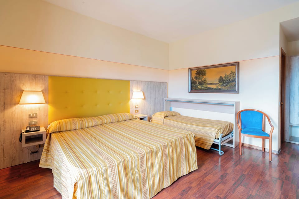 Comfort Quadruple Room, Non Smoking, Garden View | In-room safe, individually furnished, desk, blackout drapes