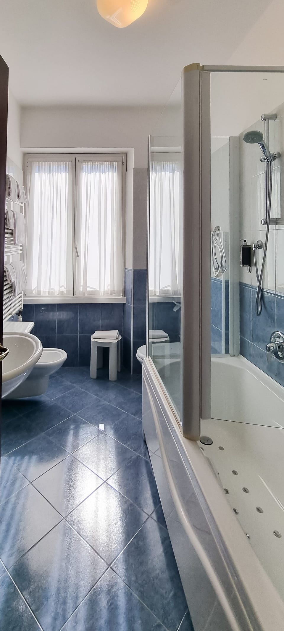 Double Room, 1 Large Twin Bed | Bathroom | Shower, hair dryer, slippers, bidet