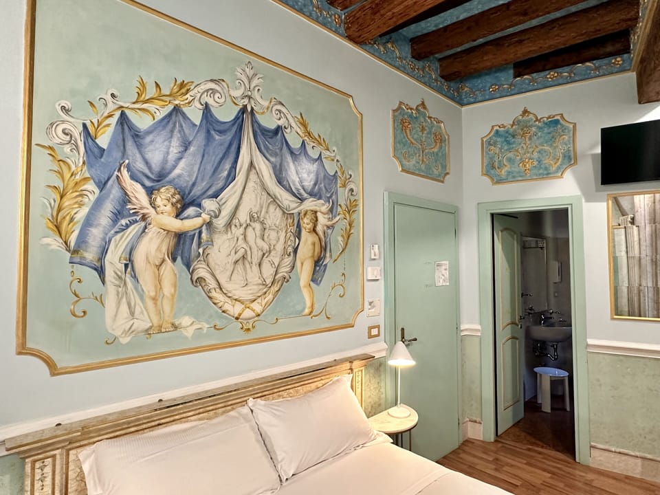 Queen Room | Frette Italian sheets, premium bedding, down comforters