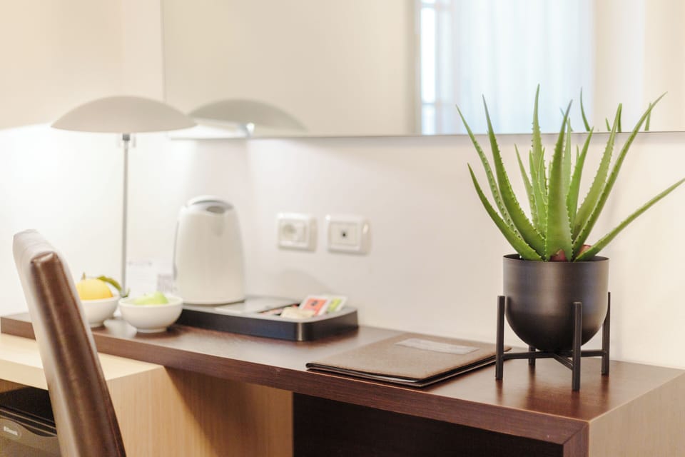 Triple Room | Select Comfort beds, minibar, in-room safe, desk