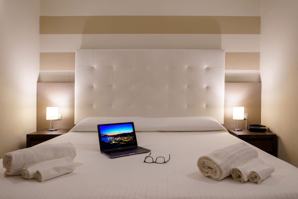 Double or Twin Room | Minibar, in-room safe, desk, WiFi