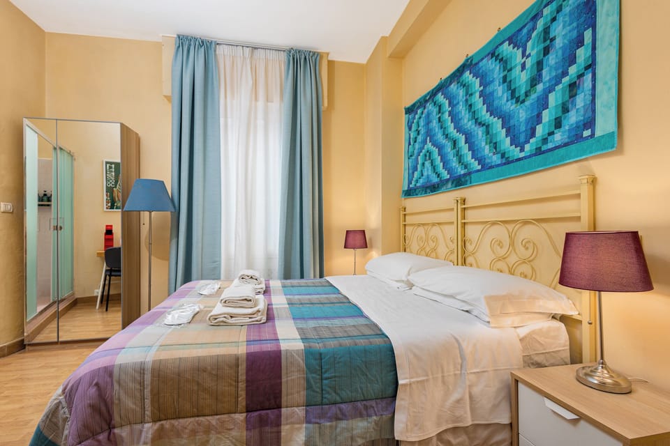 Double Room, Private Bathroom (External) | In-room safe, desk, iron/ironing board, rollaway beds