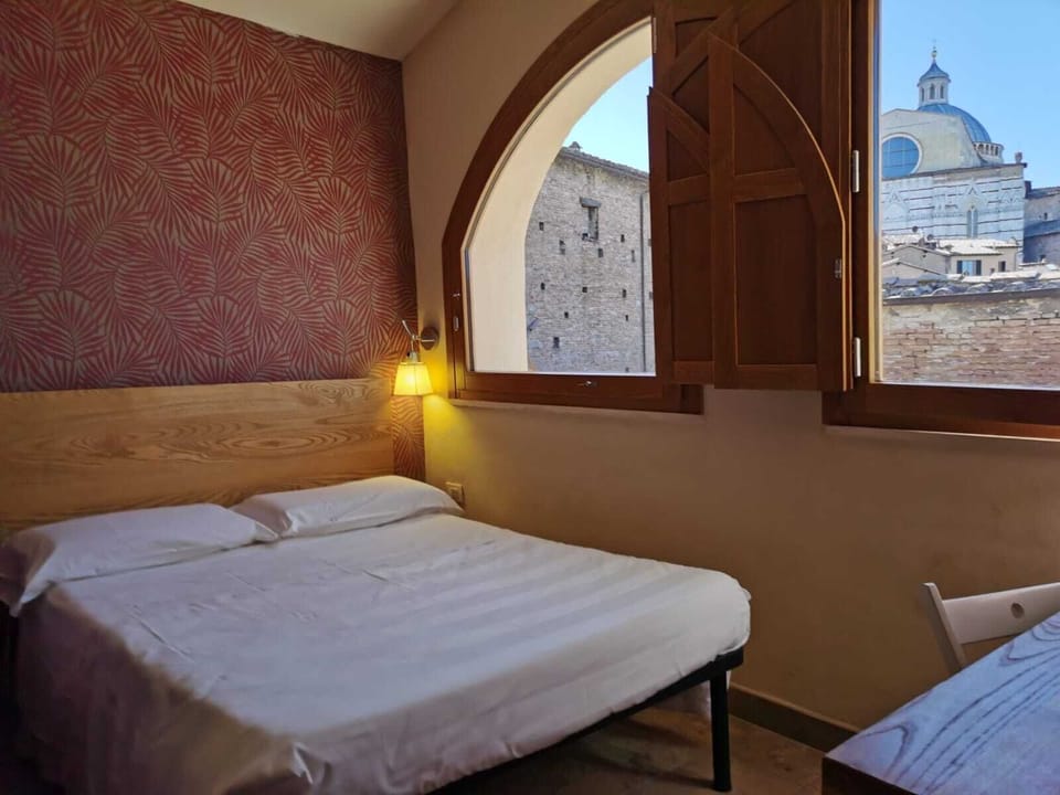 Economy Double or Twin Room, 1 Double Bed, City View, Tower (Spiral stairs) | Pillowtop beds, in-room safe, individually furnished, desk