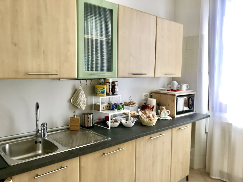 Single Room, Refrigerator, Courtyard Area | Shared kitchen | Fridge, microwave, coffee/tea maker, electric kettle